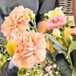 Das Foto zeigt ein blassrosa Blumenbukett.